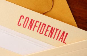 A folder with a confidential stamp