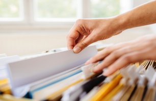 hands-in-open-drawer-of-file-cabinet.jpg